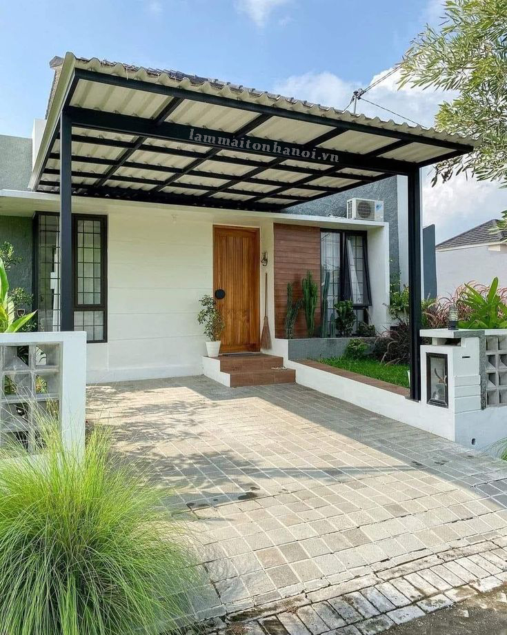 làm mái tôn che sân